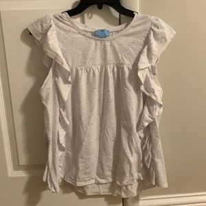 White sleeveless CeCe brand top.